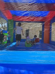 IMG 3828 1687370601 Neon Rainbow Bounce House